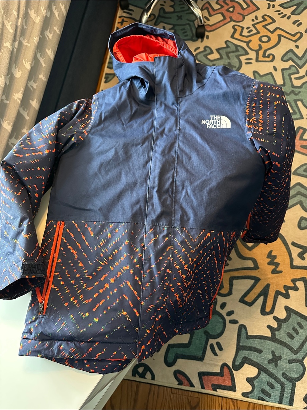 The North Face Navy Jacket with Orange Accents for Kids